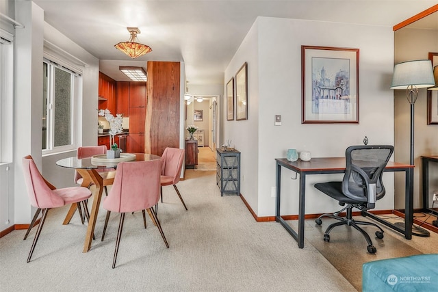 view of carpeted dining room