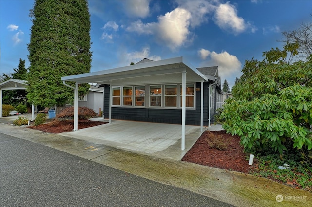 view of front of house featuring a carport