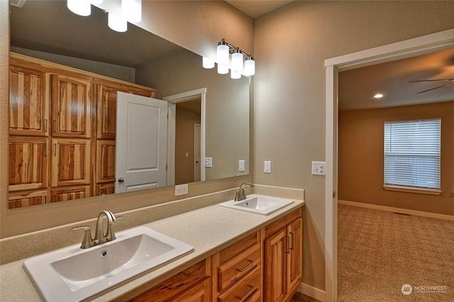 bathroom with vanity and ceiling fan