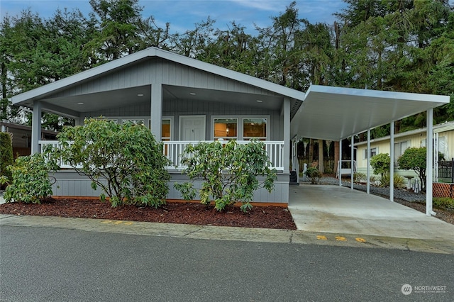 manufactured / mobile home with a carport