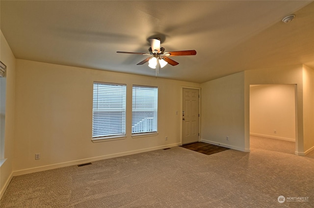 unfurnished room featuring carpet flooring and ceiling fan