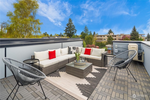 wooden deck featuring an outdoor living space