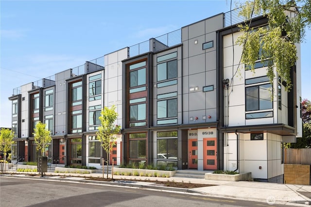 view of building exterior with a residential view