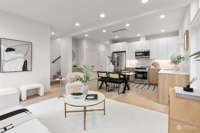 living room with light wood-type flooring