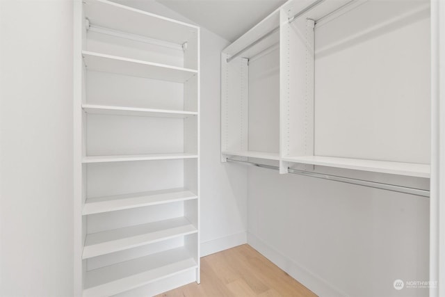 walk in closet featuring light wood-type flooring