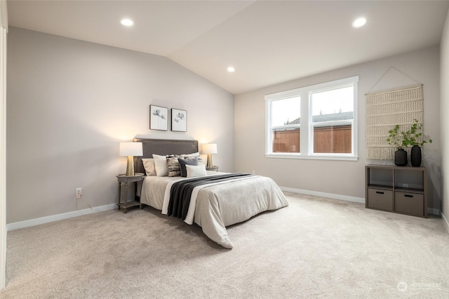 bedroom with vaulted ceiling, recessed lighting, carpet flooring, and baseboards