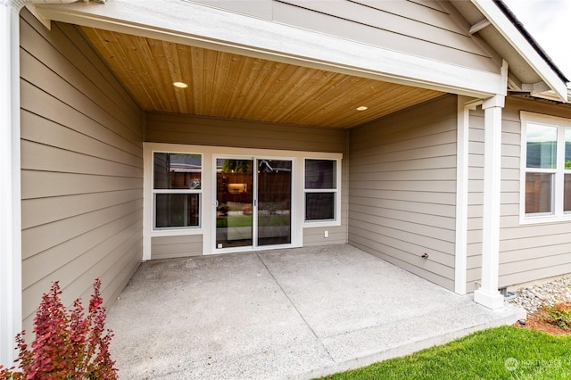 doorway to property with a patio