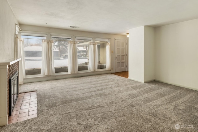 unfurnished living room with light carpet