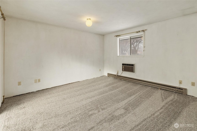 carpeted empty room featuring a fireplace, baseboard heating, and a wall unit AC