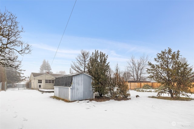 exterior space with a shed