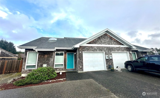 view of front of property with a garage