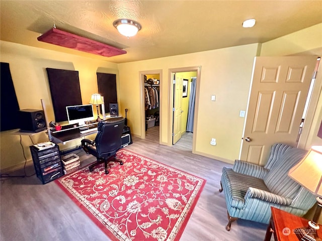 office area with light wood-type flooring