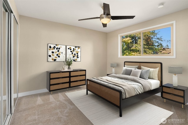 carpeted bedroom with ceiling fan