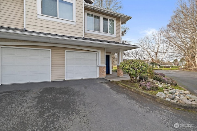 exterior space with a garage