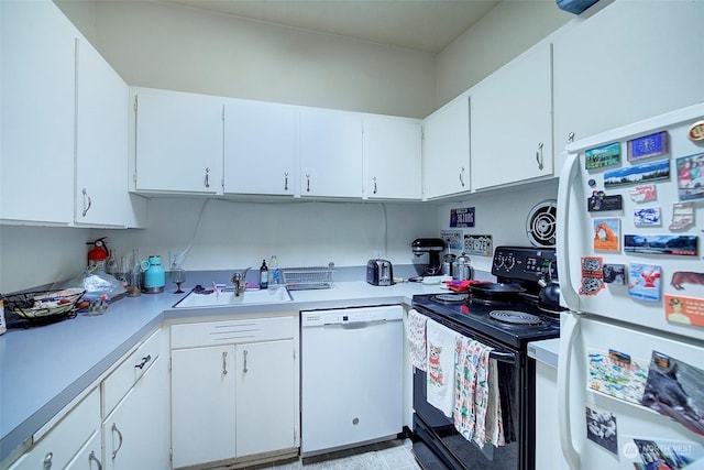 kitchen featuring white cabinets, white appliances, and sink