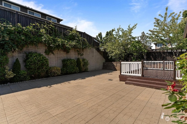 view of patio featuring a wooden deck