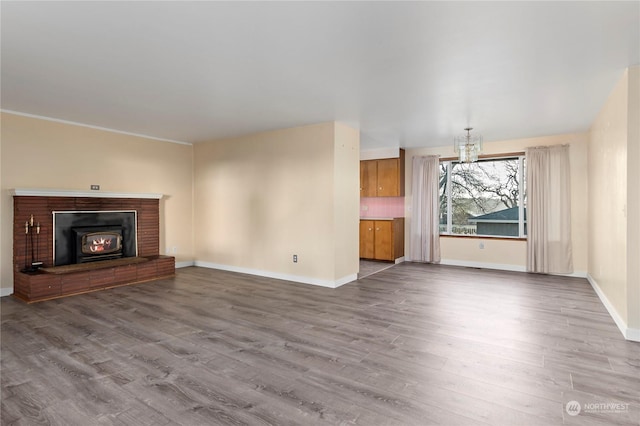 unfurnished living room featuring hardwood / wood-style floors