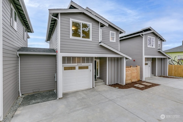 front facade with a garage