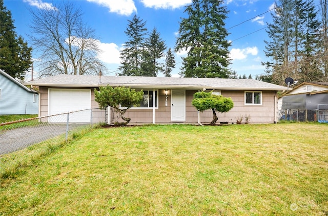 single story home featuring a garage and a front yard