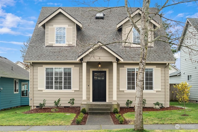 view of front facade with a front lawn