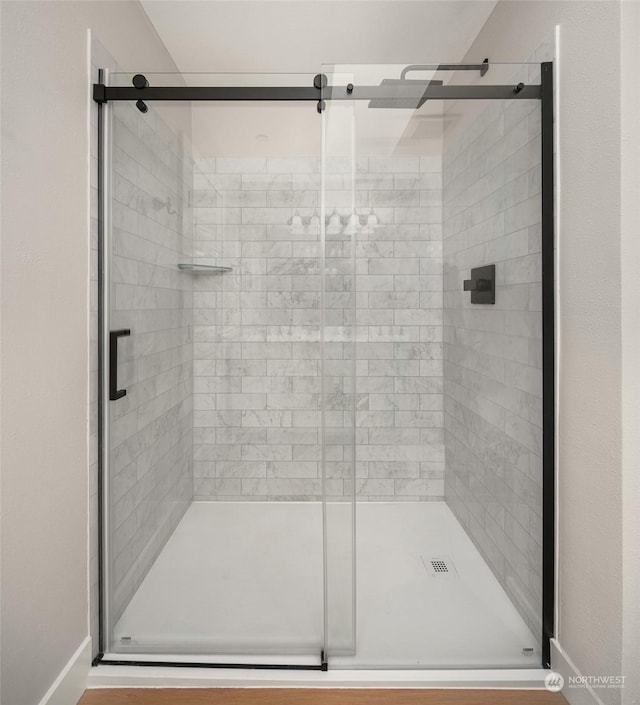 bathroom featuring walk in shower