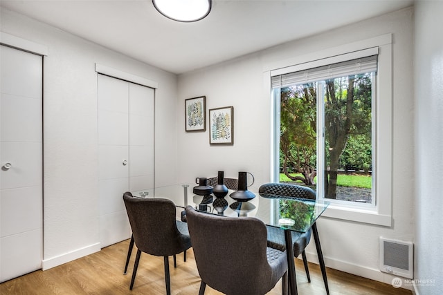 dining room featuring hardwood / wood-style flooring