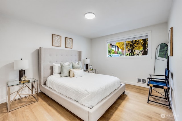 bedroom featuring light hardwood / wood-style floors