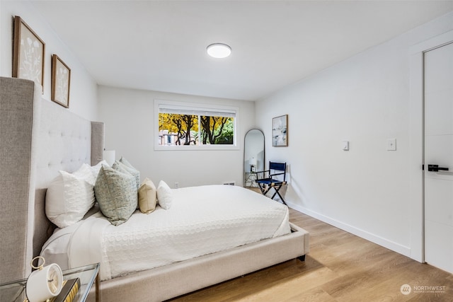 bedroom featuring light wood-type flooring