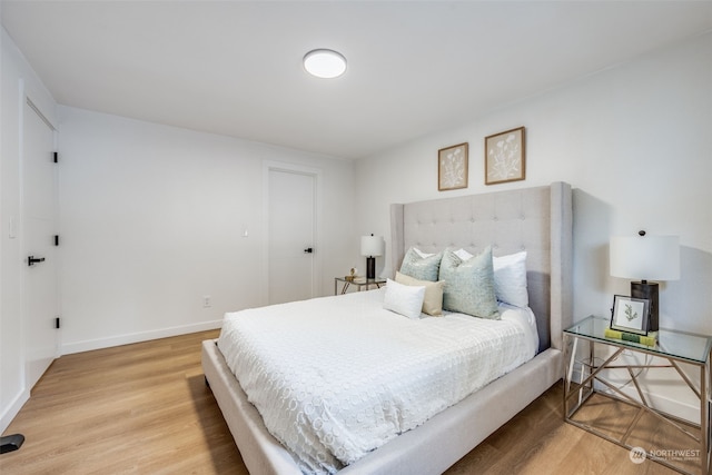 bedroom featuring hardwood / wood-style flooring