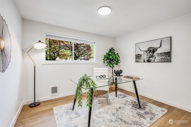 office area featuring hardwood / wood-style floors