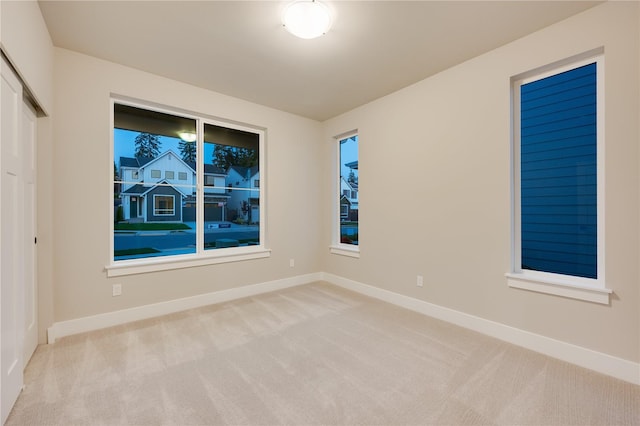 20239 125th Ave NE Unit Sm2-11, Bothell, WA 98011 - carpeted spare room with baseboards