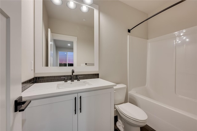 20239 125th Ave NE Unit Sm2-11, Bothell, WA 98011 - bathroom with vanity, tasteful backsplash, toilet, and tub / shower combination
