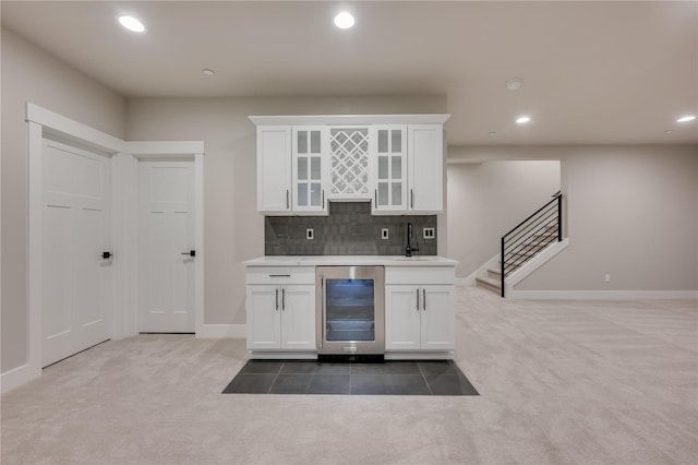 20239 125th Ave NE Unit Sm2-11, Bothell, WA 98011 - bar with beverage cooler, baseboards, recessed lighting, a sink, and carpet