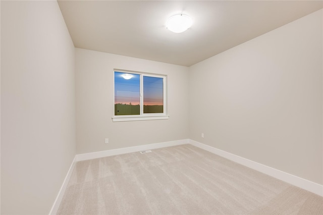 20239 125th Ave NE Unit Sm2-11, Bothell, WA 98011 - unfurnished room with baseboards, visible vents, and light carpet