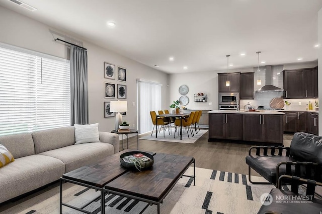 living room featuring dark hardwood / wood-style floors