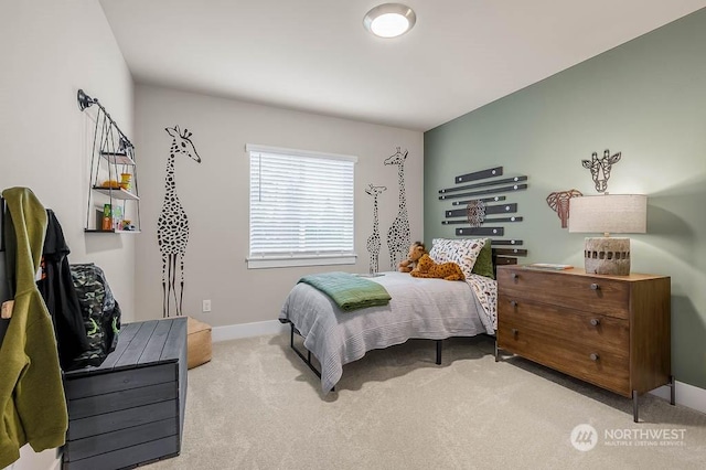 bedroom with light colored carpet