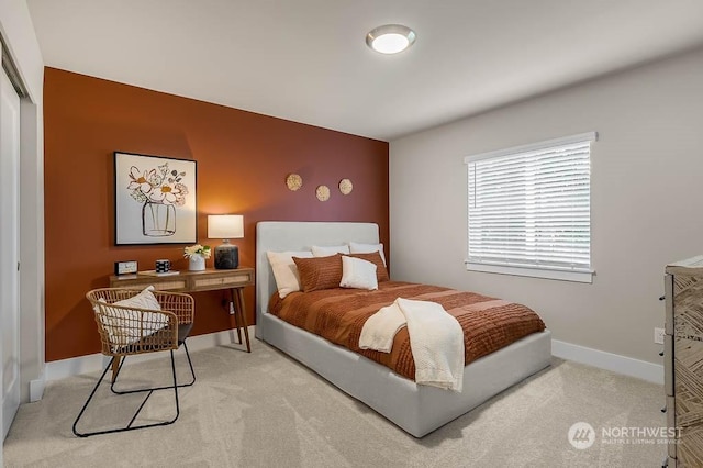 bedroom with carpet flooring and a closet