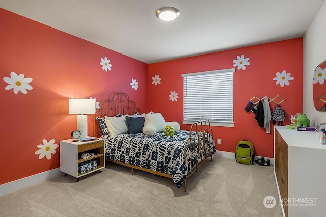 bedroom with light carpet