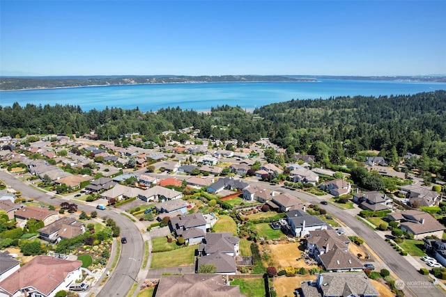 drone / aerial view with a water view