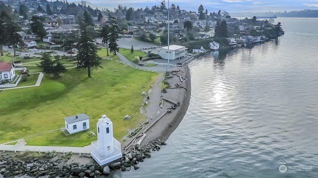 drone / aerial view featuring a water view