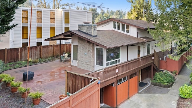 rear view of house with a patio area