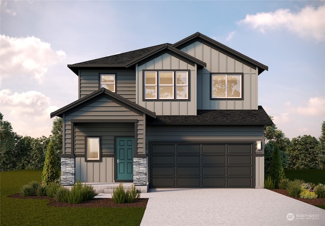 view of front facade featuring a garage and a front lawn