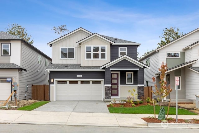 craftsman house with a garage