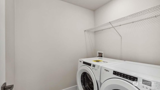 washroom featuring separate washer and dryer