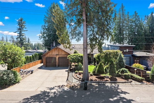 view of front of house featuring an outbuilding and a garage