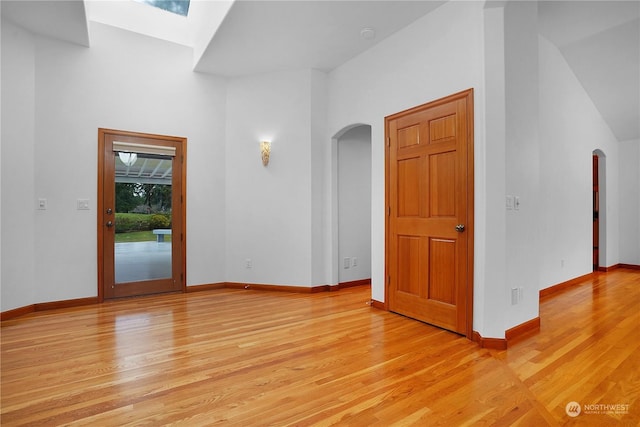 spare room with light hardwood / wood-style floors