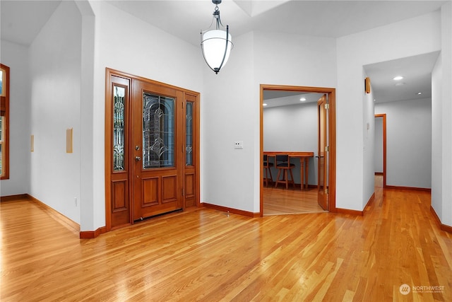 foyer entrance featuring light hardwood / wood-style floors