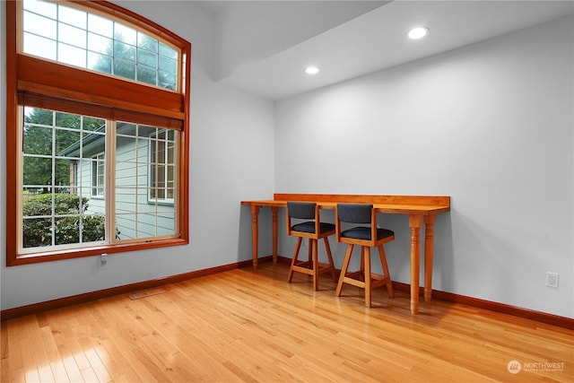 office space featuring light wood-type flooring