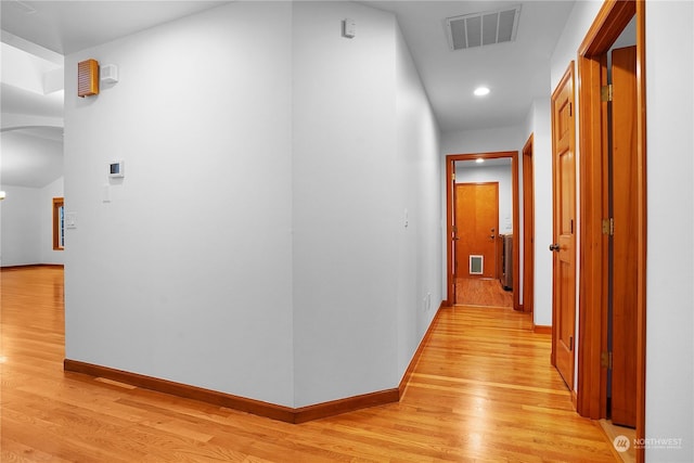 hallway featuring light hardwood / wood-style floors