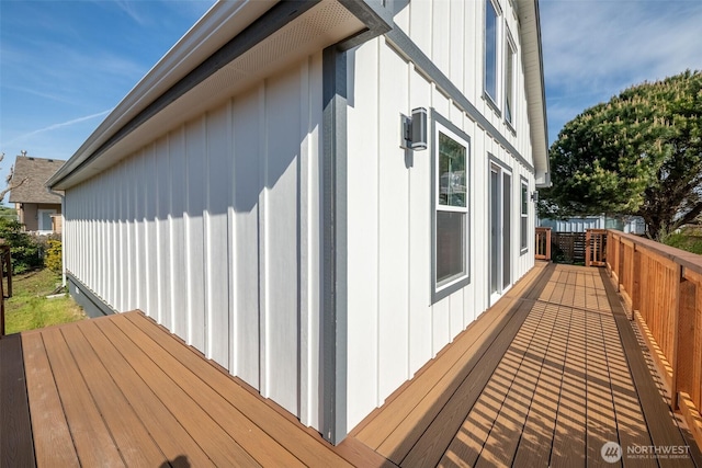 585 Ocean Shores Blvd SW, Ocean Shores, WA 98569 - view of home's exterior with a wooden deck and board and batten siding